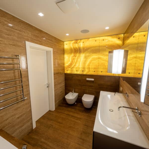 Luxury bathroom vanity. High angle view of the luxury bathroom with wooden walls and floor. Stock photo Luxury bathroom vanity High angle view of the luxury bathroom with wooden walls and floor Stock photo