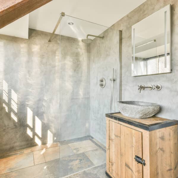 Modern bathroom with shower, sink and toilet