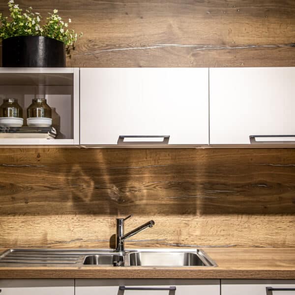 Modern wooden kitchen interior, steel kitchen faucet 