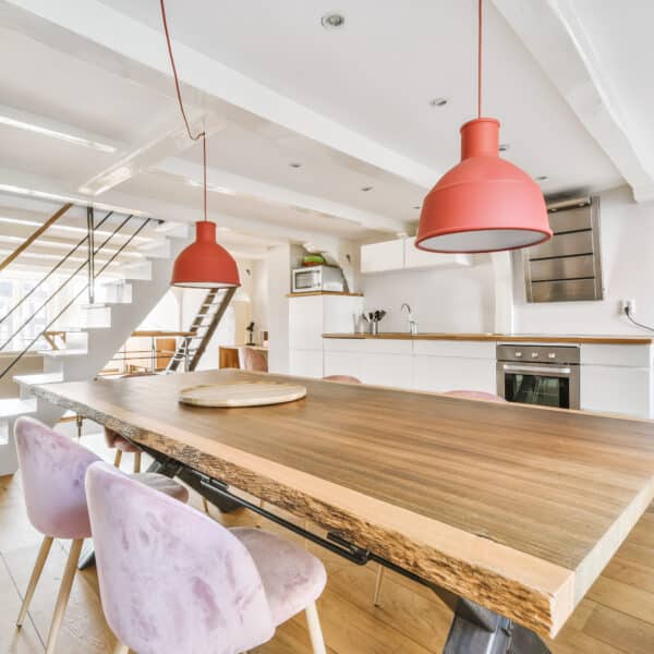 Empty dining room near kitchen